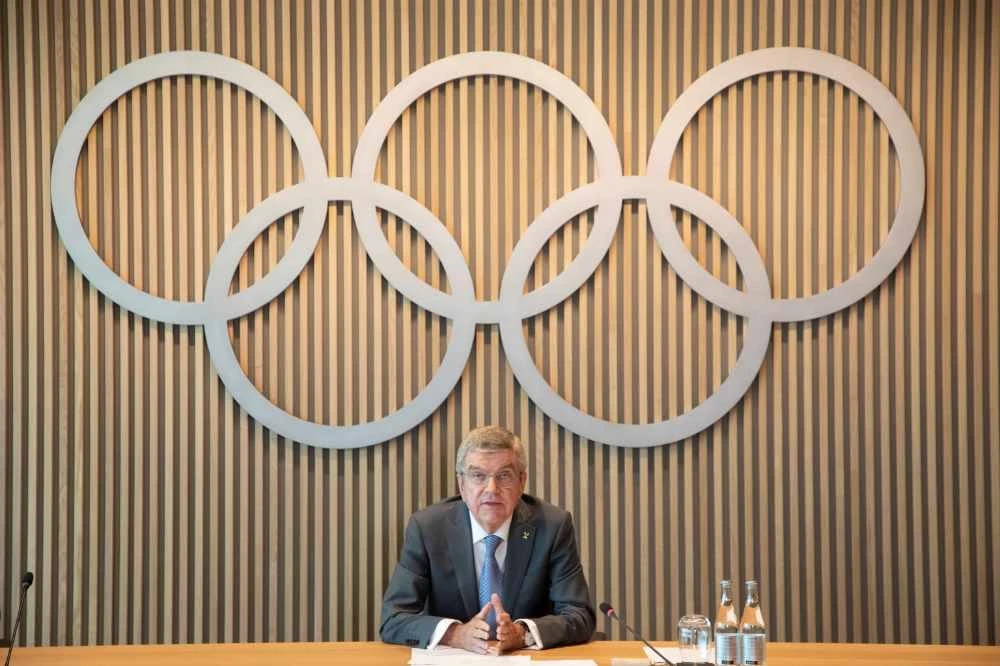 Thomas Bach, President of the International Olympic Committee (IOC) adresses a news conference after a meeting of IOC's executive board, amid the coronavirus disease (COVID-19) outbreak, in Lausanne, Switzerland, on June 10, 2020. (IOC/Greg Martin/Handout via REUTERS)