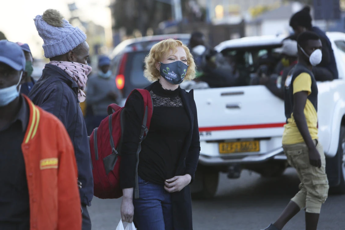 Brenda Mudzimu, founder of Miss Albinism Trust, walks on the streets of Harare, in this Monday, June, 8, 2020 photo. (AP)