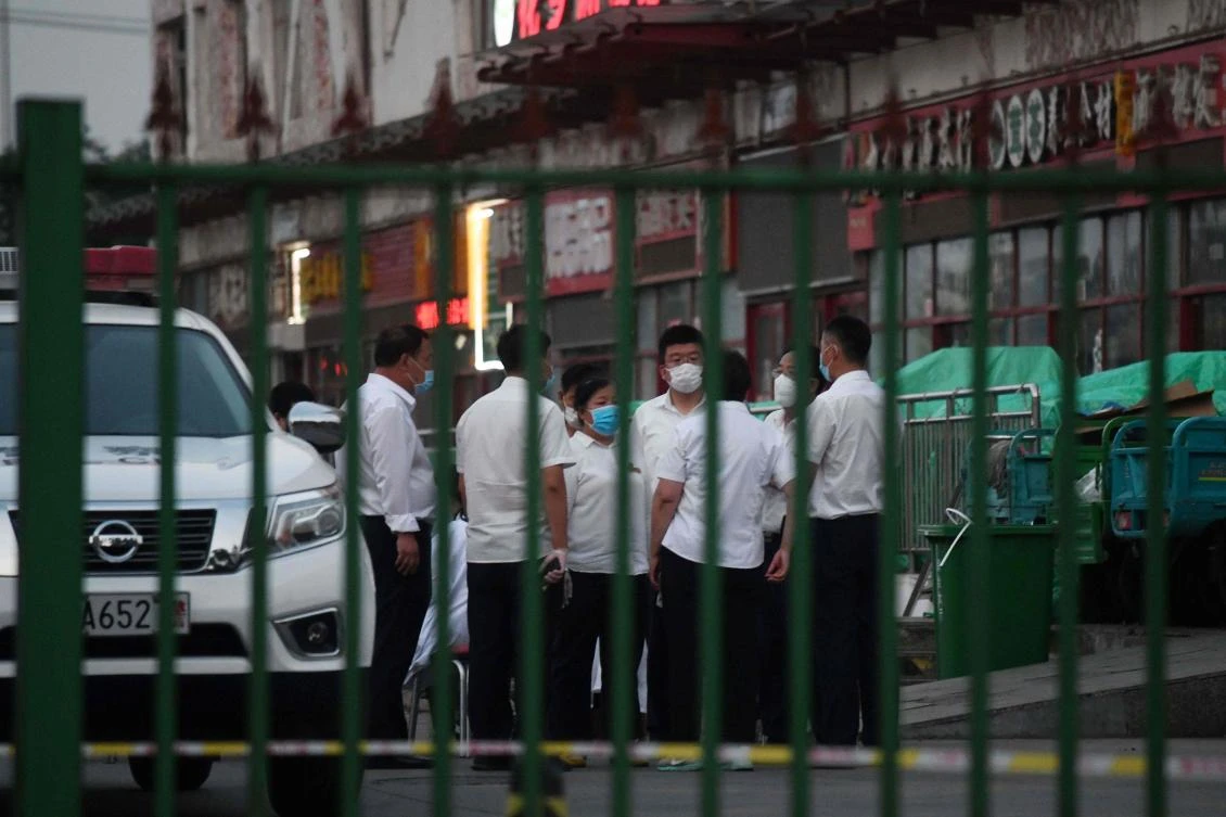 Beijing’s Xinfadi meat wholesale market and Jingshen seafood market were closed for disinfection and environmental sample collection after it emerged both were visited by two newly identified coronavirus patients, local media reported. (AFP)