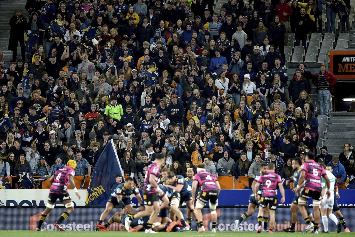 Spectators watch the Super Rugby Aotearoa rugby game between the Highlanders and Chiefs in Dunedin, New Zealand, Saturday, June 13, 2020. (AP)