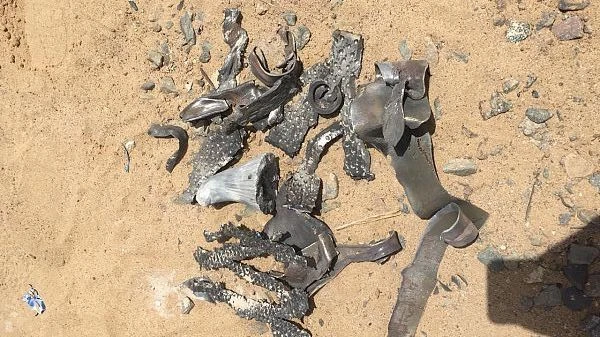 Fragments of the Houthi ballistic missile can be seen. (SPA)