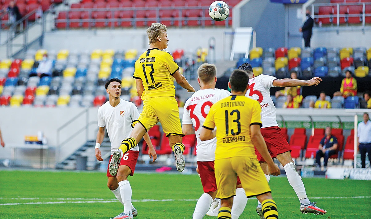 Dortmund relief as Haaland scores late to beat Dusseldorf