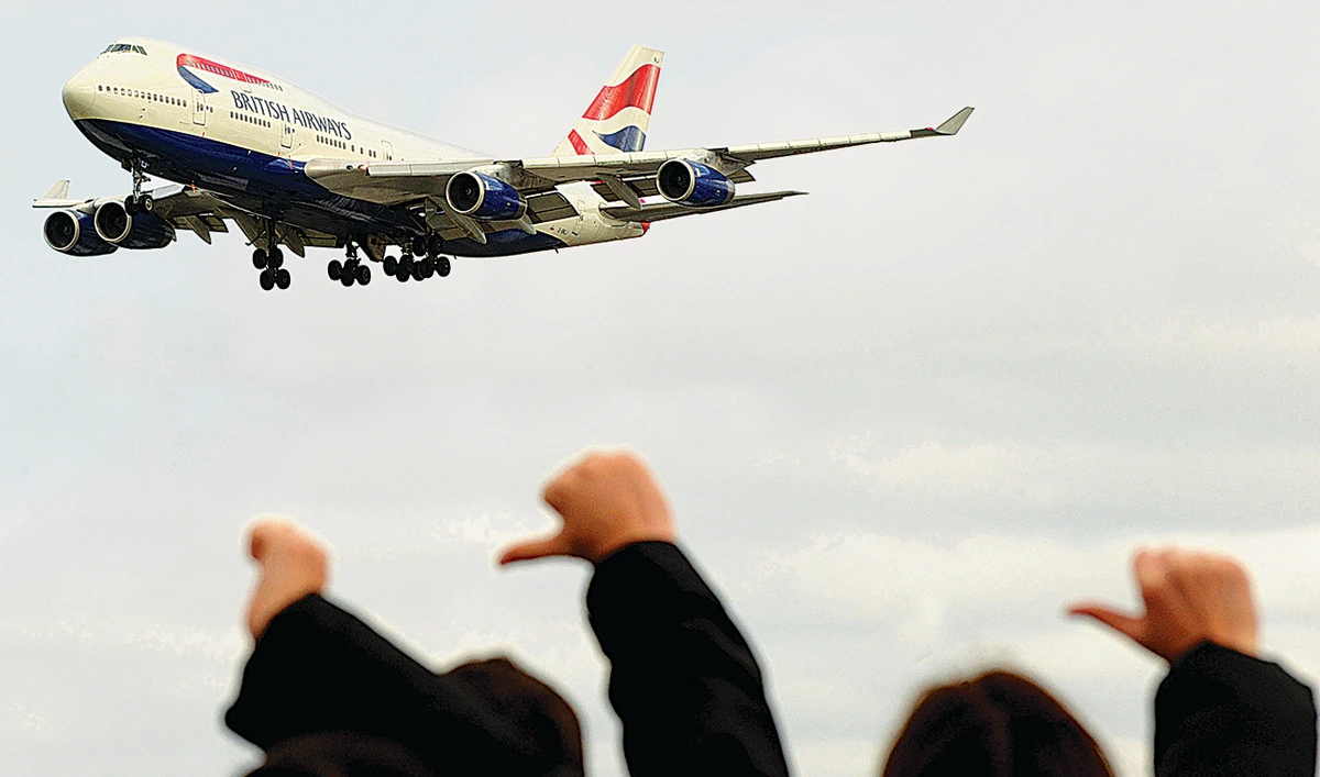 British Airways was accused of trying to take advantage of the coronavirus crisis to cut 12,000 jobs and downgrade the conditions of employees. (AFP)