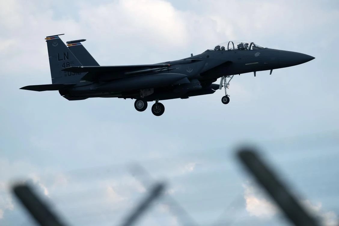 A US Air Force (USAF) F-15E Strike Eagle fighter jet prepares to land at RAF (Royal Air Force) Lakenheath, east of England, on June 15, 2020. (AFP)