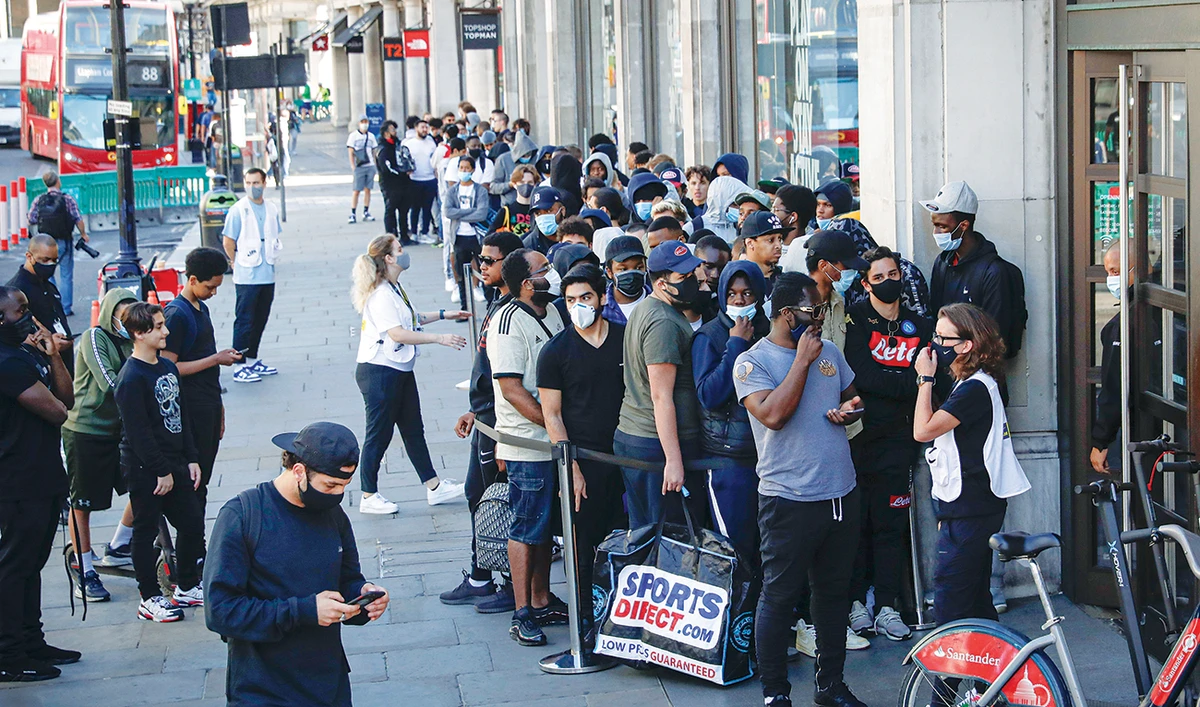 Crowds and queues as English shops reopen