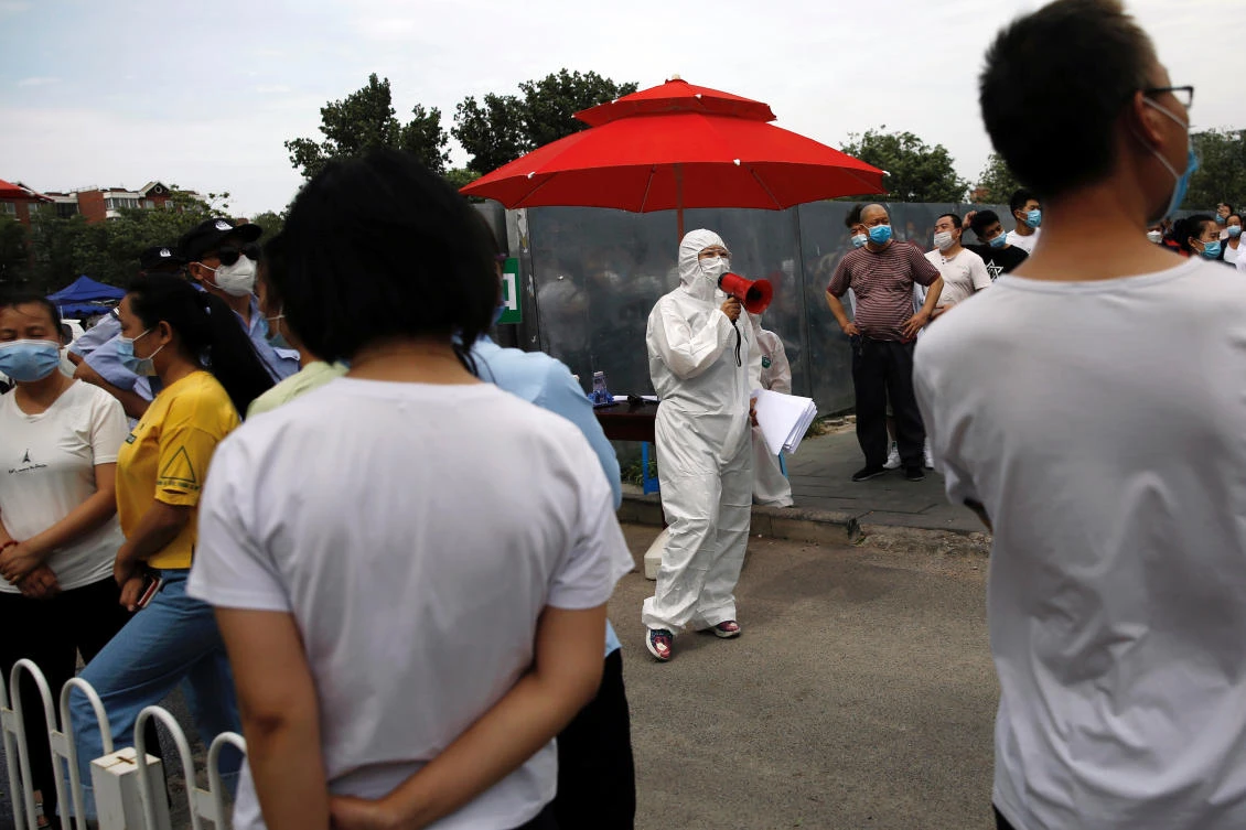 Beijing has expanded daily testing capacity to 90,000, but the new program puts a strain on resources. (Reuters)