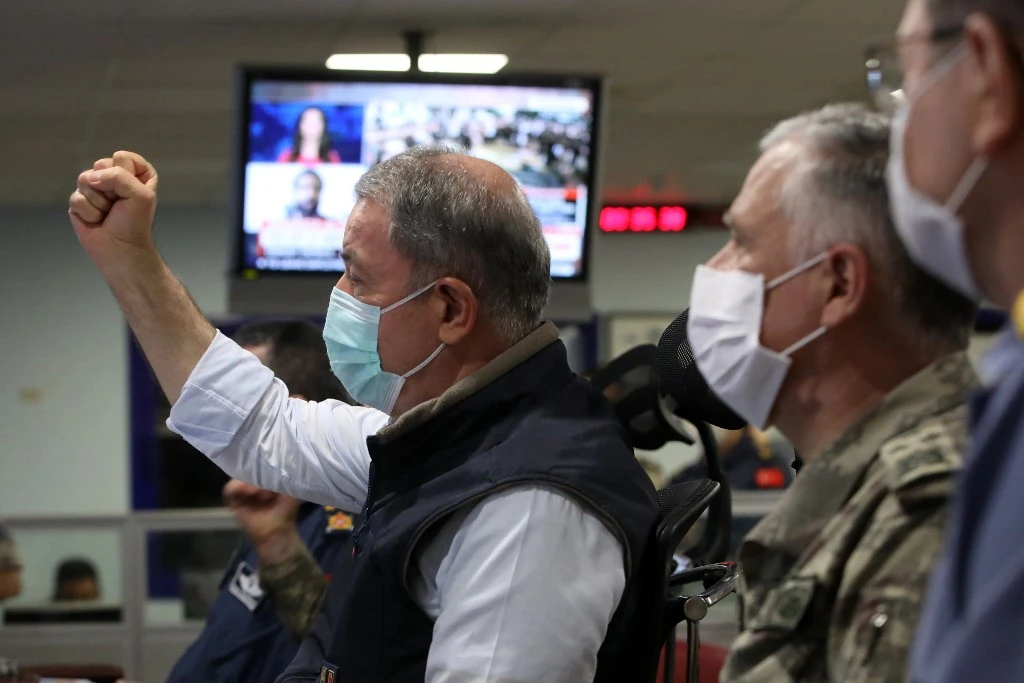 Turkish Defense Minister Hulusi Akar, left, and army commanders monitor Operation Claw-Eagle in northern Iraq at Air Force Command Control Center in Ankara June 15, 2020. (Turkish Ministry of Defense Press Office/AFP)