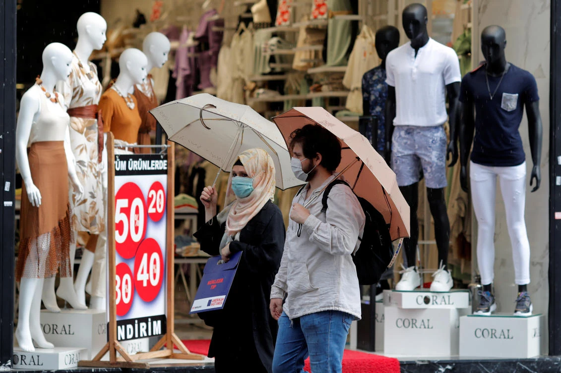 As Turks have poured out into streets, parks, malls and to vacation spots, face masks were made compulsory in major cities. (Reuters)