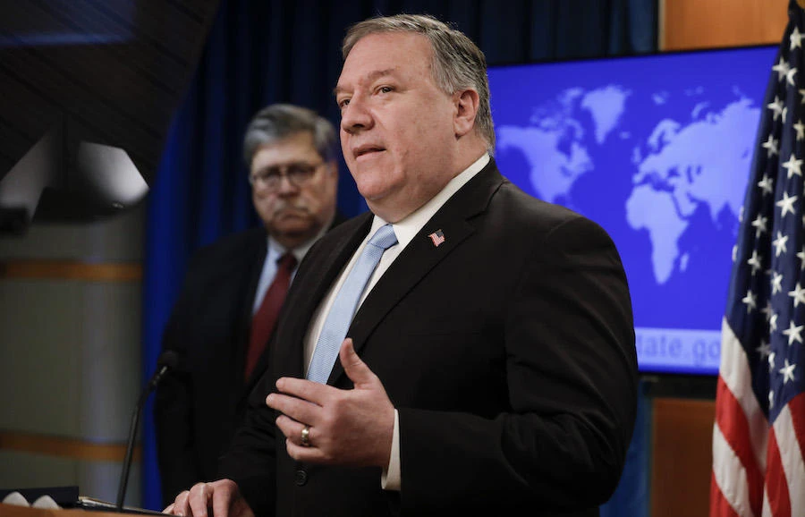 US Secretary of State Mike Pompeo (R) holds a joint news conference on the International Criminal Court with US Attorney General William Barr (L, rear), at the State Department in Washington, DC, on June 11, 2020. (File/AFP)