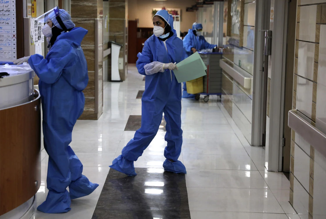 Nurses work in a COVID-19 ward in Tehran. (AP)
