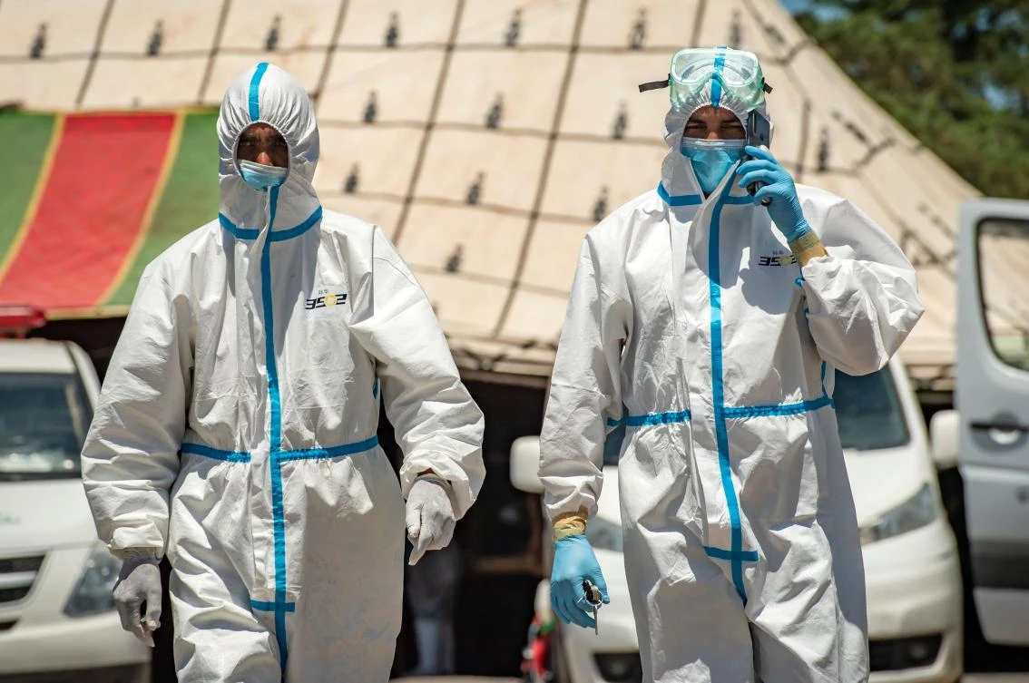 A dozen ambulances were stationed in Moulay Bousselham, above, one of the quarantined towns, ready to be dispatched to pick up confirmed cases. (AFP)