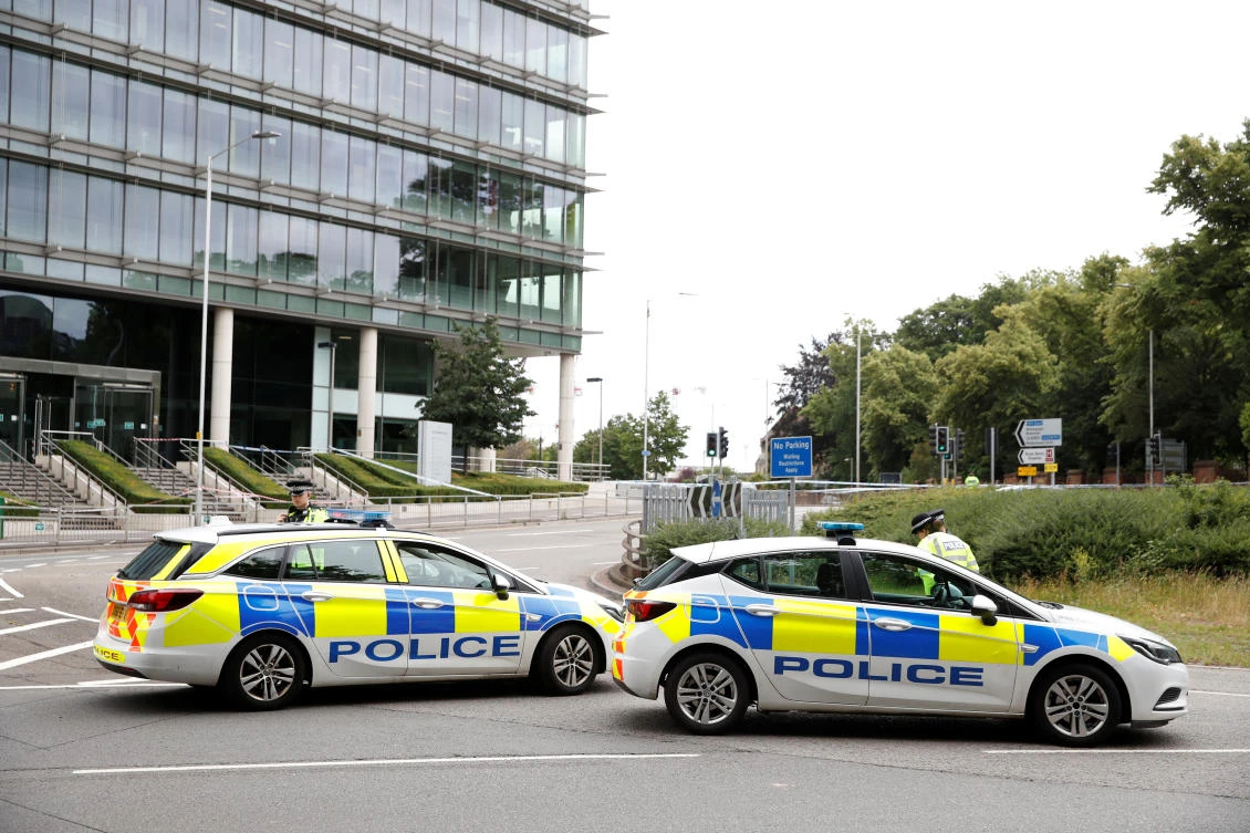 Police cordon off Forbury Gardens — a popular park situated next to the ruins of the 12th-century Reading Abbey. (Reuters)