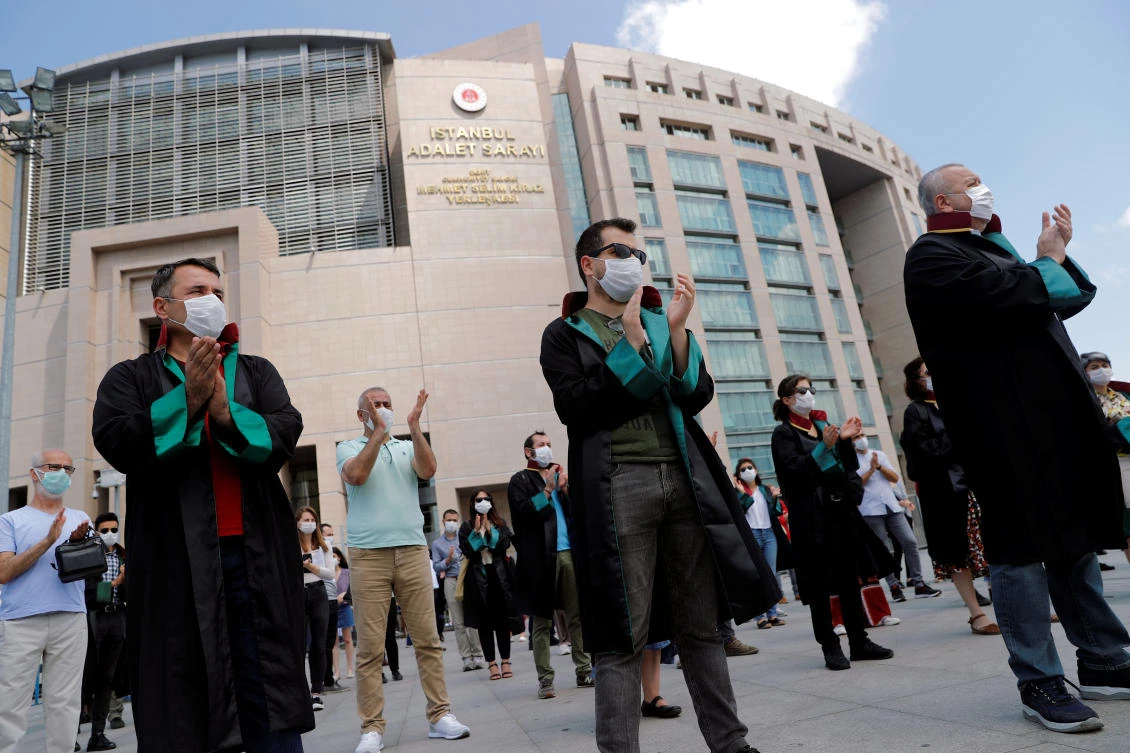 Lawyers gather in front of the Justice Palace to demonstrate against the police stopping senior lawyers marching to the capital Ankara in a protest against a draft bill governing the organisation of bar associations in Istanbul. (REUTERS)