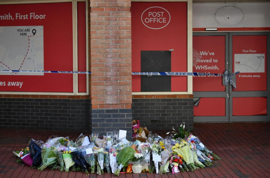Floral tributes left in memory of the victims of the June 20 stabbings, are pictured in the centre of Reading, west of London on June 23, 2020. (AFP)