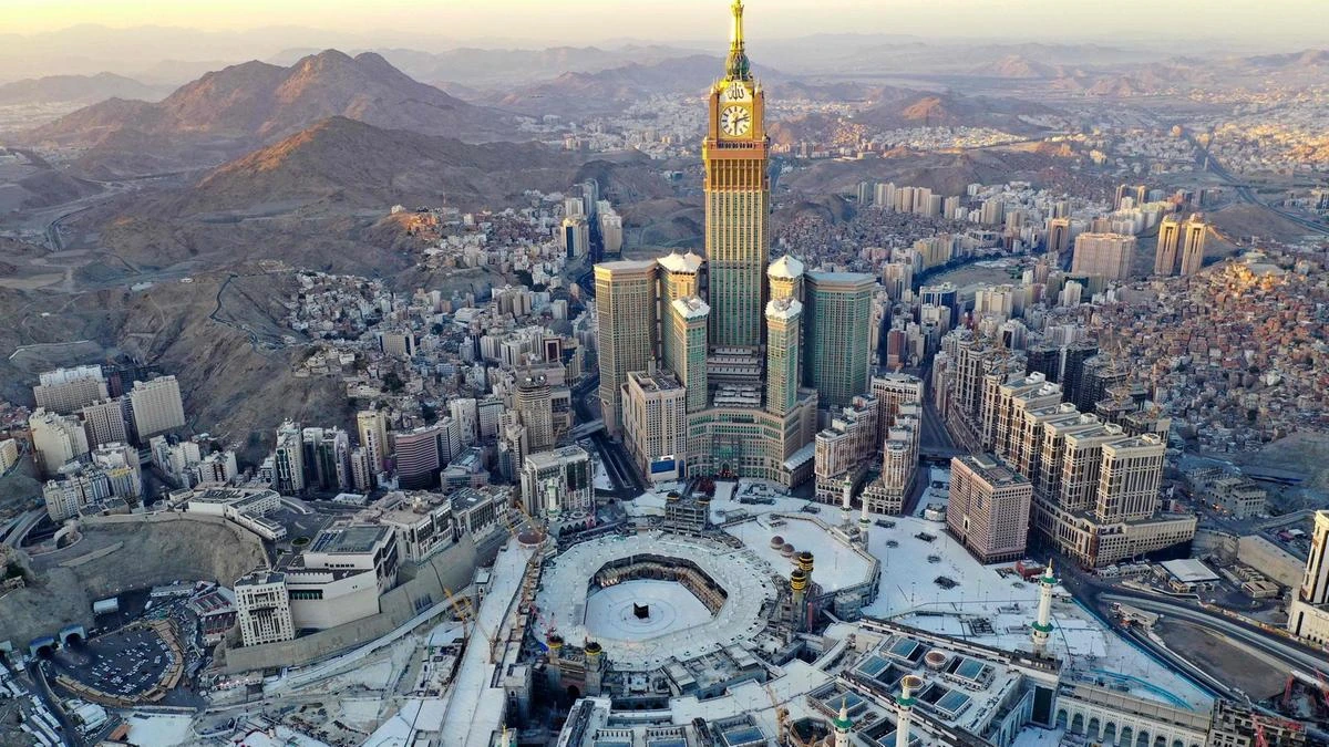 This picture taken on May 24, 2020 during the early hours of Eid al-Fitr, shows an aerial view of the holy city of Makkah, Saudi Arabia with the Abraj al-Bait Makkah Royal Clock Tower overlooking the Grand Mosque and Kaaba in the centre. (AFP)