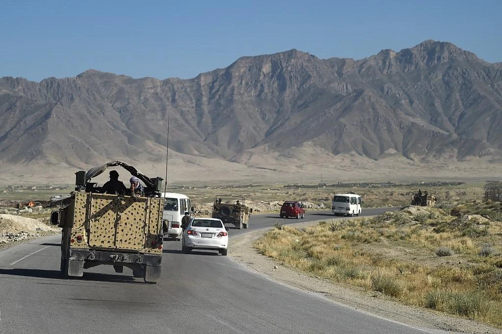 The Afghan government has released Taliban insurgents from jail as part of peace negotiations with the group. Above, soldiers escort a Taliban prisoners convoy during their release from Bagram prison. (AFP file photo)