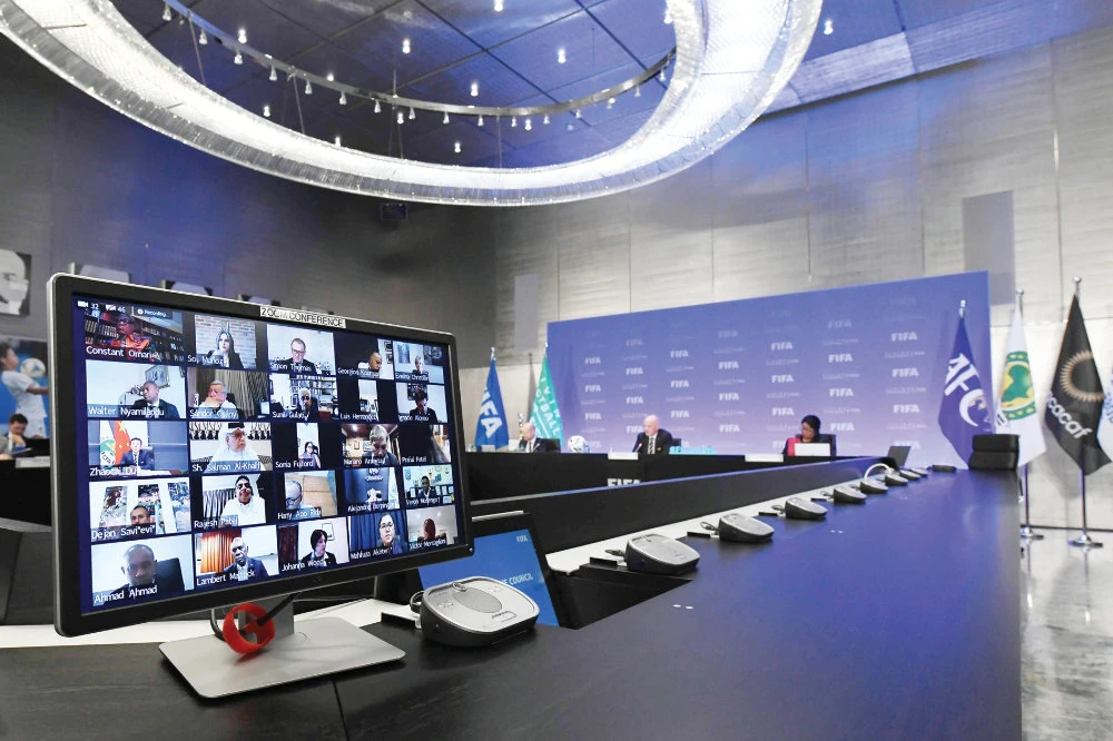 A video monitor with the FIFA delegates is pictured during a virtual FIFA Council Meeting held behind closed doors at FIFA headquarters on Thursday. (AFP)