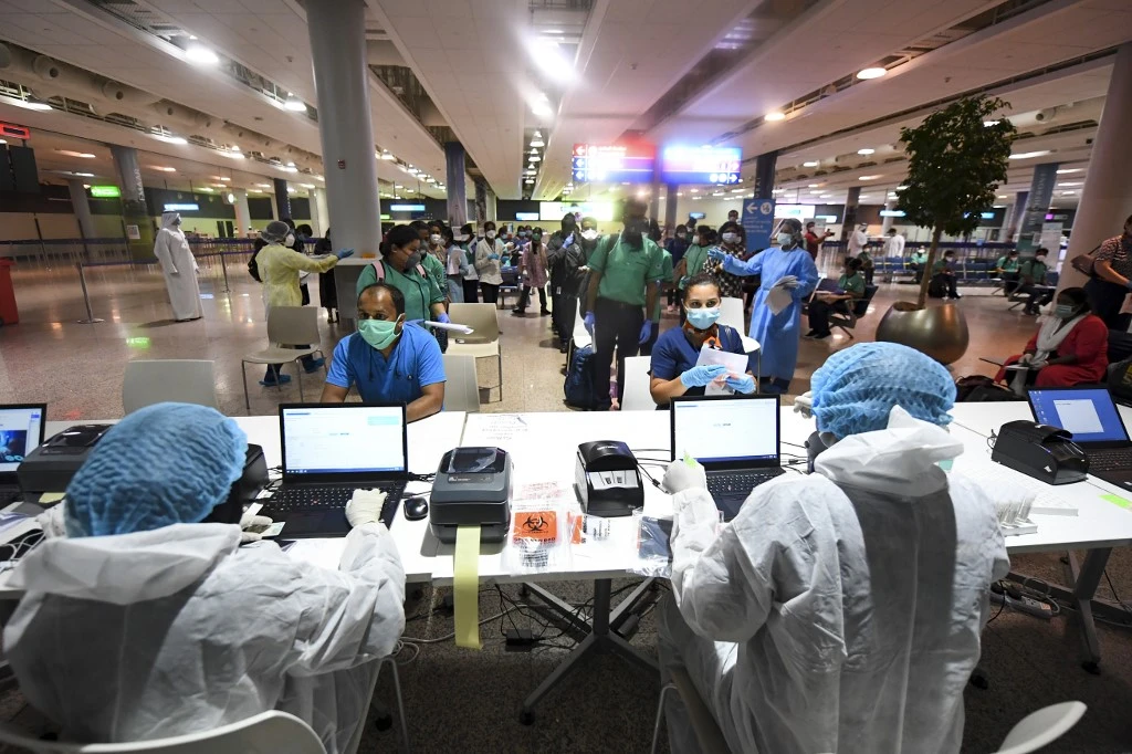 Members of an Indian medical team arrive at Dubai International Airport last month. (AFP/File)