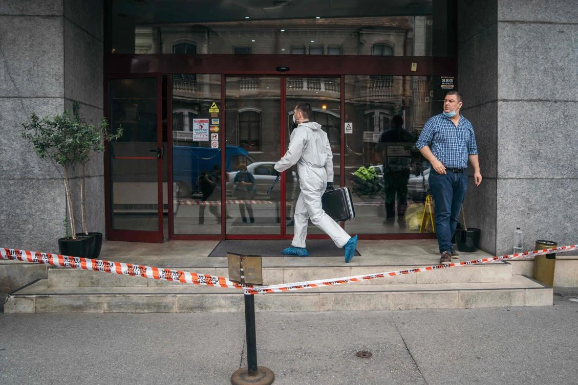 Fugitive Iranian judge Gholamreza Mansouri plunged to his death from a top floor of his hotel in Bucharest last week. Above, forensic investigators work at the scene. (AFP)