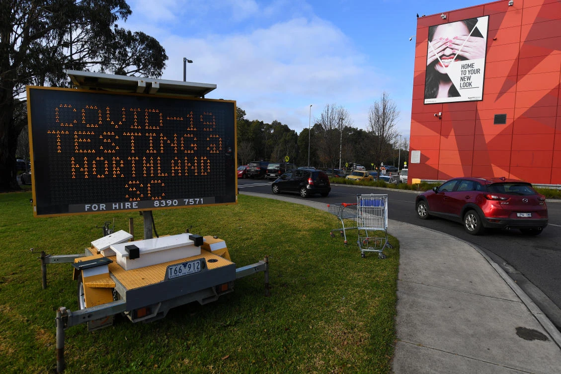 Friday’s 30 new COVID-19 cases was the 10th straight day of double-digit rises in new cases in Melbourne. Above, signage for a testing facility in the Victorian state. (AAP Image via Reuters)