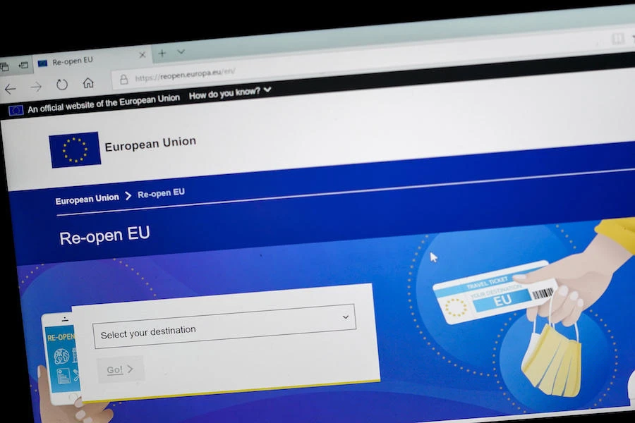 A computer screen with the main web page of the official European Union website "Re-open EU" for information on the re-opening of Europe, as countries lift travel restrictions that were taken as a measure to curb the spread of the Covid-19 pandemic, caused by the novel coronavirus. (AFP)