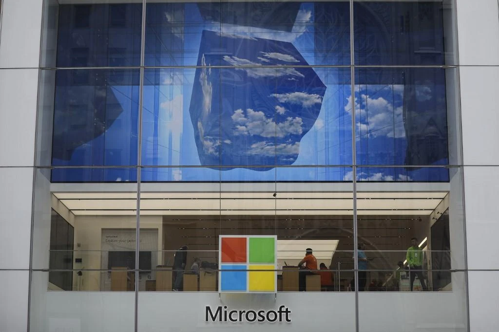 Microsoft said Friday it is permanently closing nearly all of its physical stores around the world. (File/AFP)