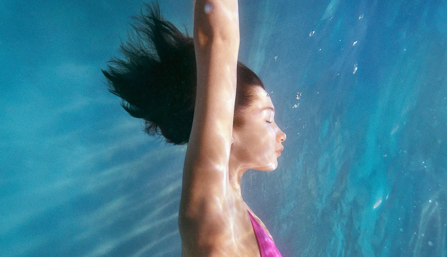 Bella Hadid photographed by Charlotte Wales for Calvin Klein Swimwear spring 2020. Supplied