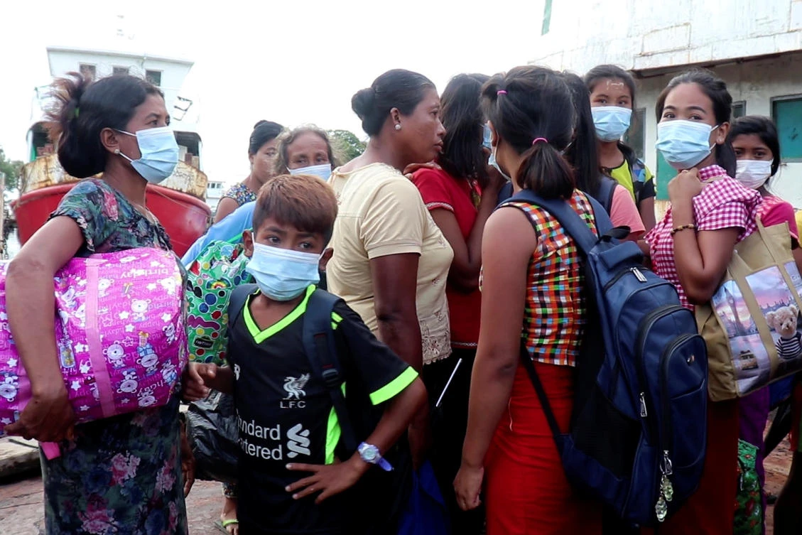 People who fled from Rathedaung township arrive in Sittwe, the capital of Rakhine state in Myanmar on June 27, 2020. (Reuters)