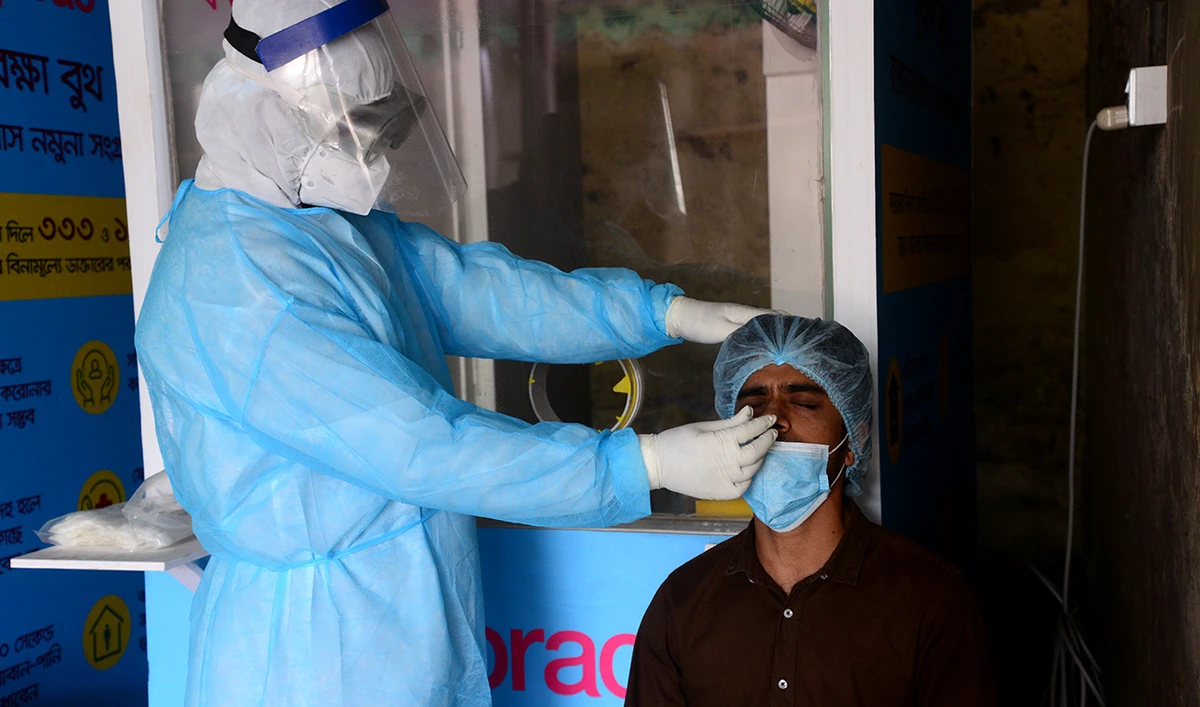 A man gets tested for the COVID-19 coronavirus at the Bangabandhu Sheikh Mujib Medical University in Dhaka, Bangladesh, on June 3, 2020. (Shutterstock)