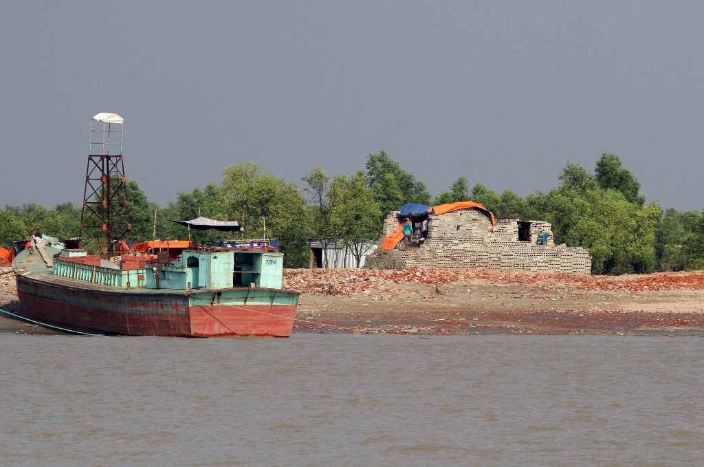 Above, a structure is being constructed on Bhashan Char island off the Bangladeshi coast as it is being prepared for the relocation of Rohingya refugees in this October 15, 2018 photo. (AFP)