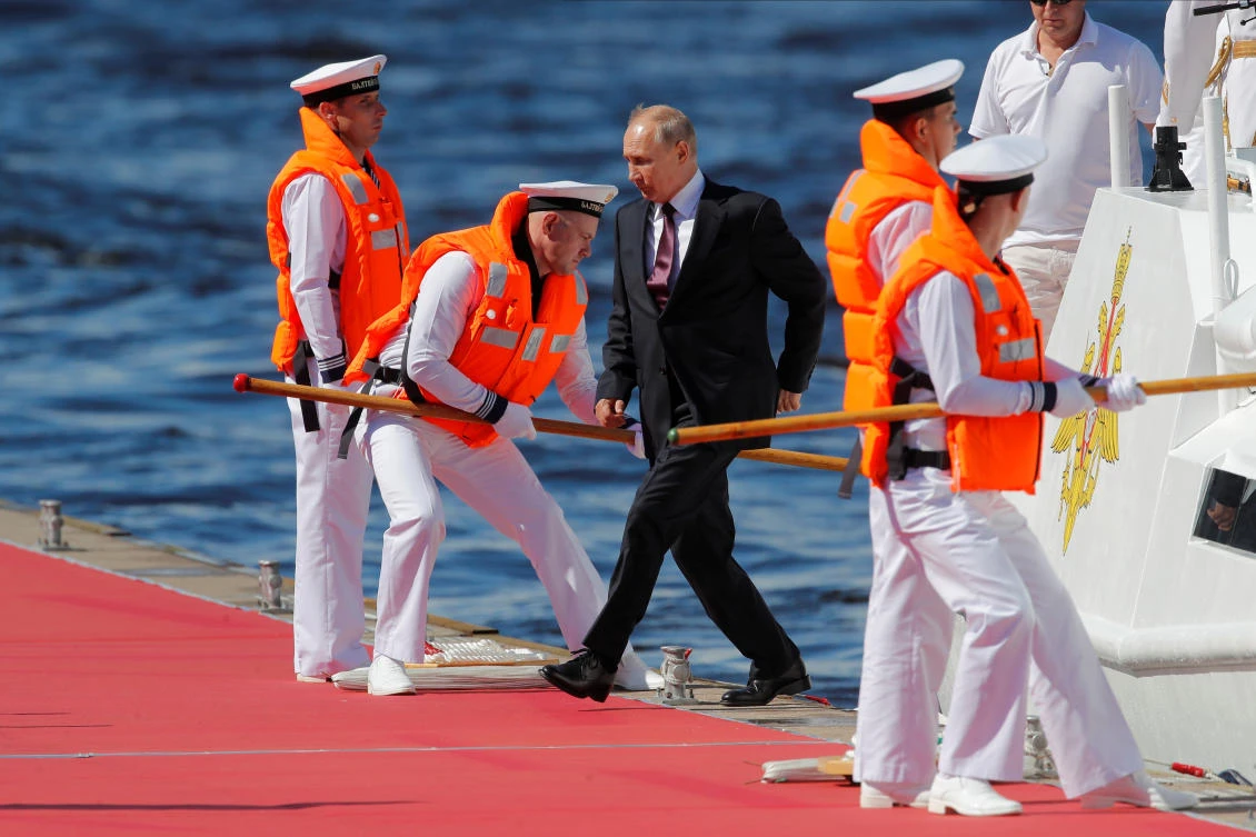 Russian President Vladimir Putin arrives to attend the Navy Day parade in Saint Petersburg, Russia July 26, 2020. Dmitri Lovetsky/Pool via REUTERS