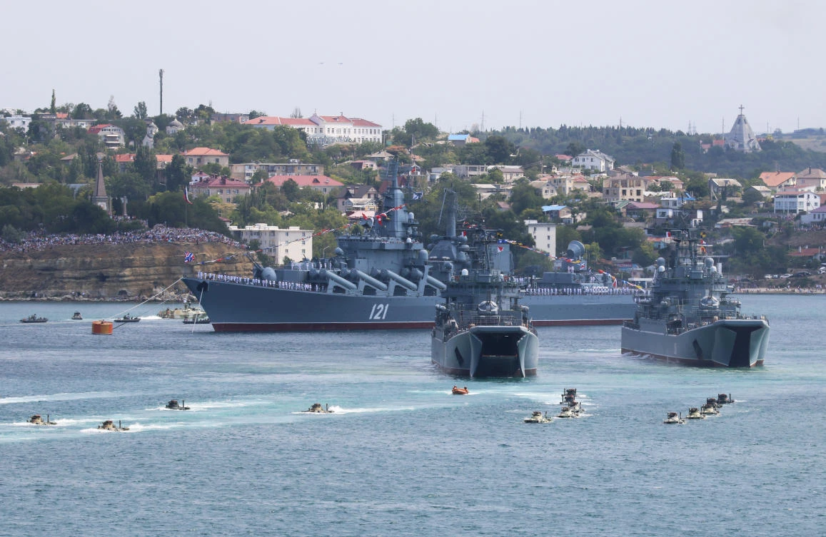 Russian armoured personnel carriers submerge from amphibious assault ships during the Navy Day parade in the Black Sea port of Sevastopol, Crimea July 26, 2020. REUTERS/Alexey Pavlishak