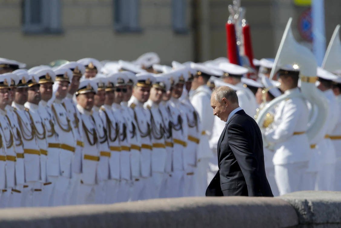 Russian President Vladimir Putin arrives to attend the military parade during the Navy Day celebration in St.Petersburg, Russia, Sunday, July 26, 2020.(AP Photo/Dmitri Lovetsky, Pool)
