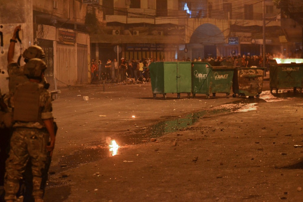 Lebanese anti-government protesters clash with soldiers in Tripoli during protests over a spiralling economic crisis. (File/AFP)