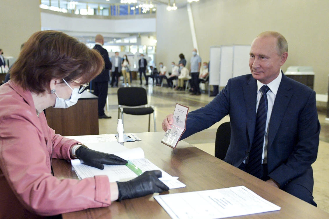 Russian President Vladimir Putin, above at a voting at a polling station in Moscow, said in recent interview that he had not made up his mind about whether to run again. (Kremlin Pool Photo via AP)