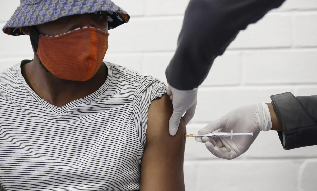 A volunteer receives a COVID-19 test vaccine injection developed at the University of Oxford in Britain, at the Chris Hani Baragwanath hospital in Soweto, Johannesburg, South Africa. (File/AP)