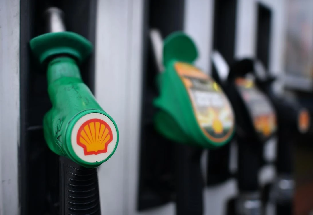 (FILES) In this file photo taken on January 30, 2018 the logo of energy giant Royal Dutch Shell is pictured on pumps at a petrol station in London. (AFP)