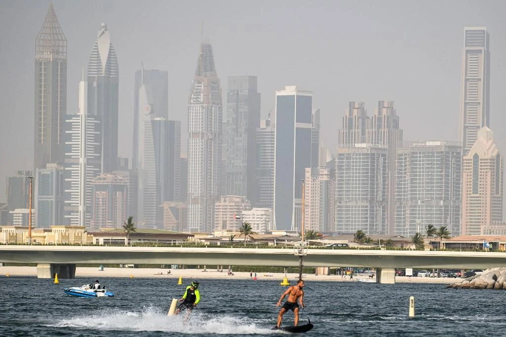 The easing of COVID-19 restrictions in the UAE has been welcomed by the public despite concerns about safety, analysis of social media posts in relation to official announcements shows. (File/AFP)
