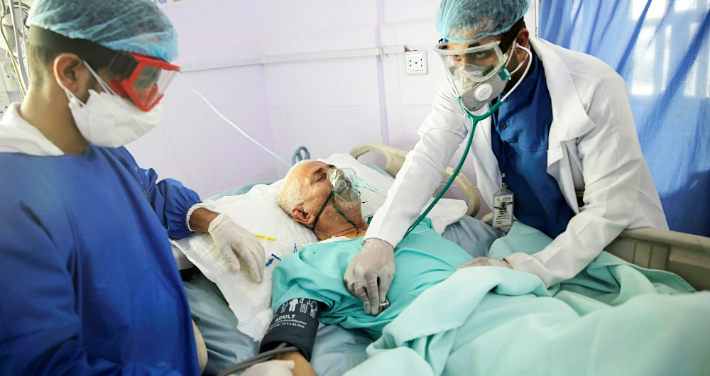 The total number of infections in government-controlled areas is 1,190, including 318 fatalities. (AP)