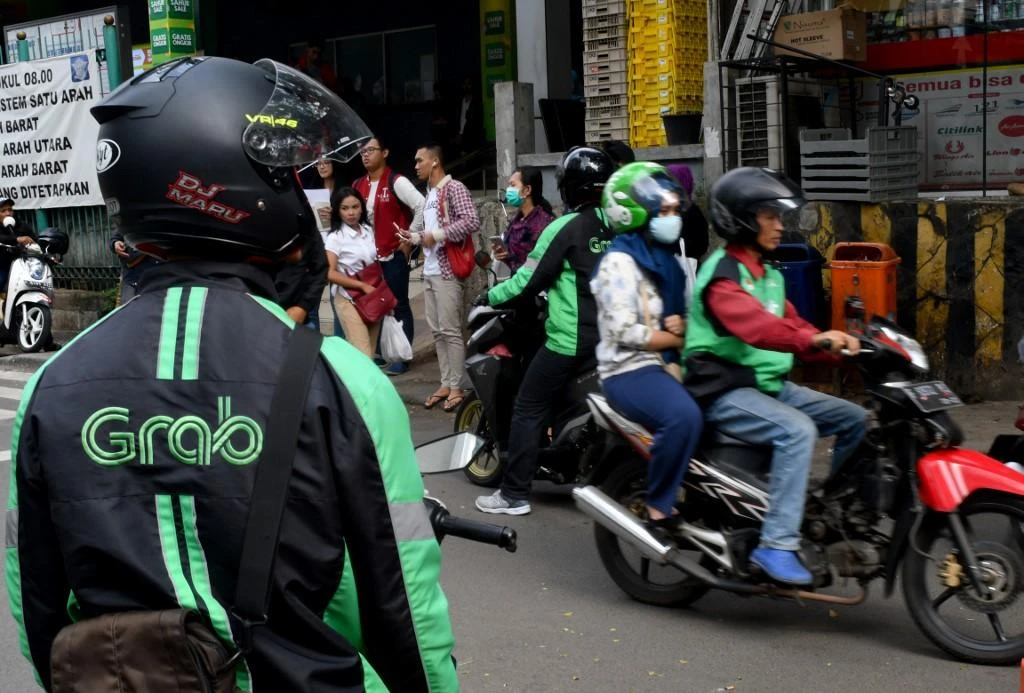 Indonesia’s anti-trust watchdog levies $3 million in fines on Grab and partner