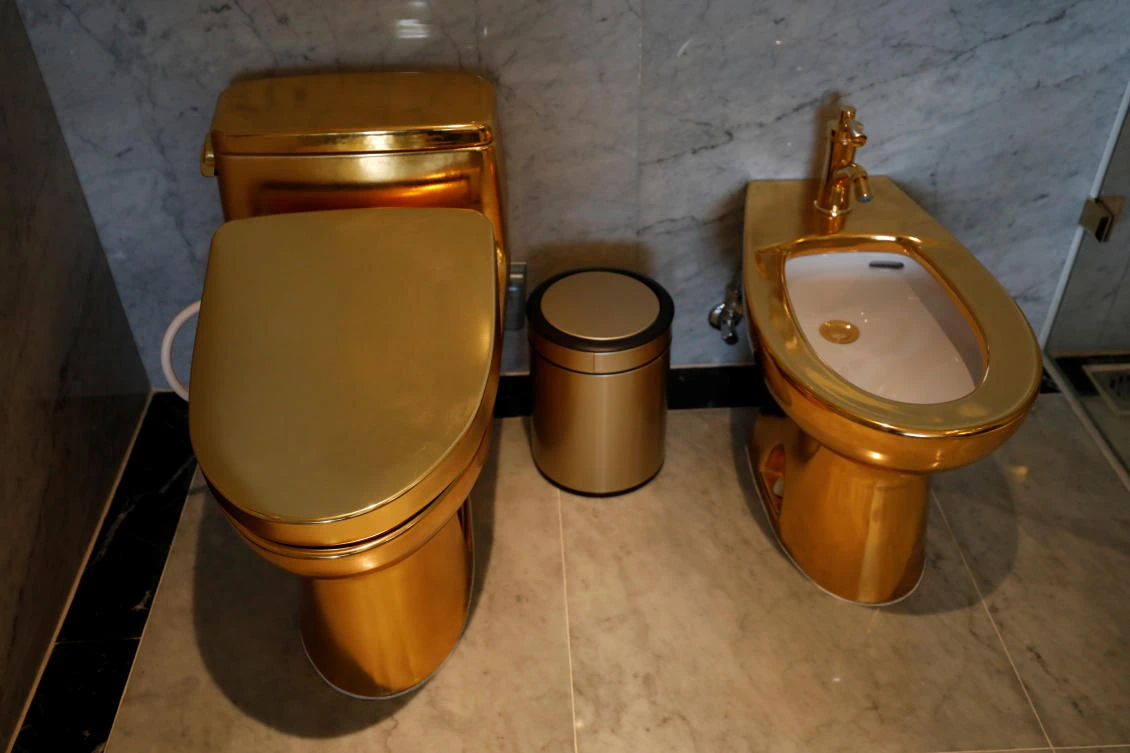 Gold plated toilets are seen at the newly-inaugurated Dolce Hanoi Golden Lake hote. (Reuters)