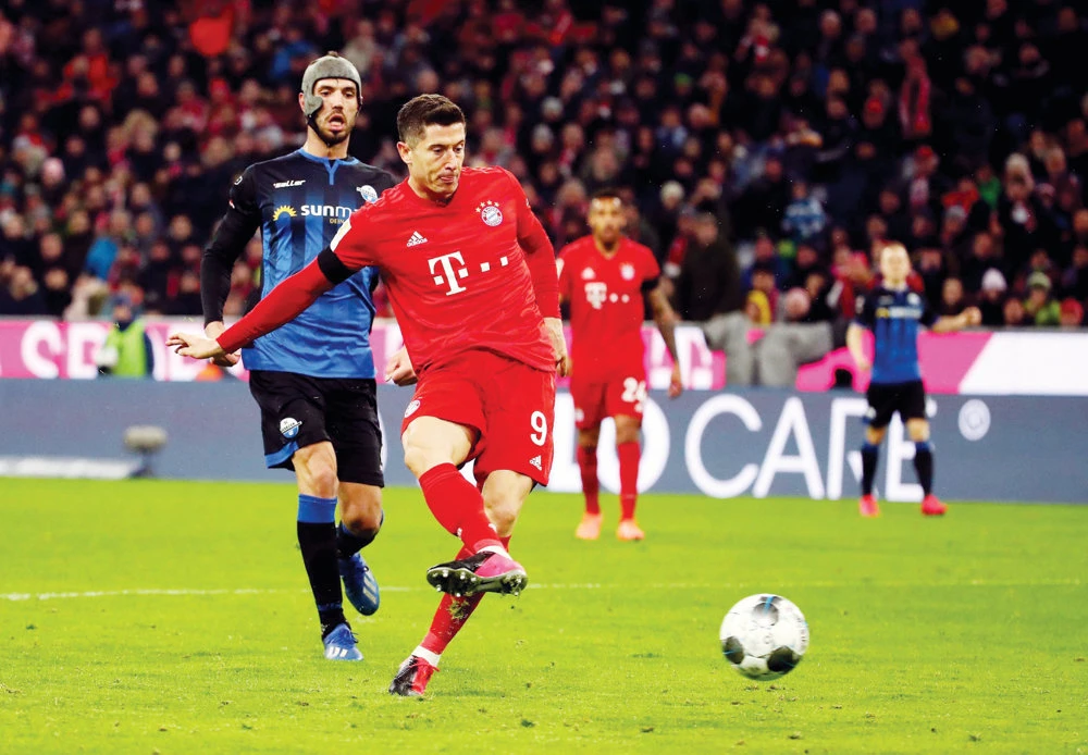 Bayern Munich’s Robert Lewandowski scores a goal during a match between Bayern Munich and SC Paderborn at Allianz Arena, in Munich. (Reuters/Files)