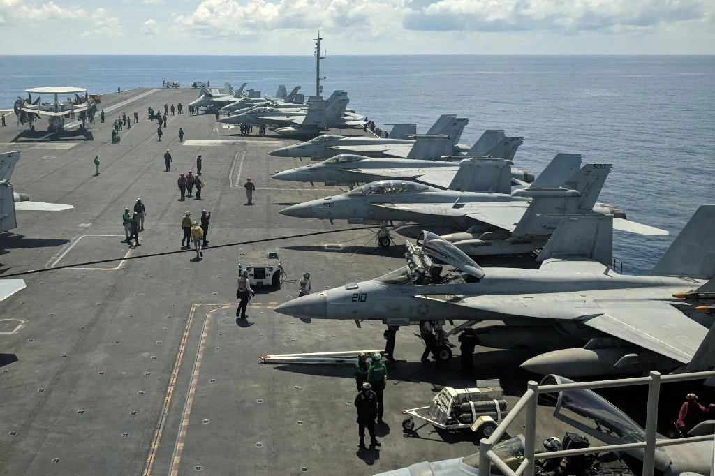 The USS Ronald Reagan, above, has maintained a regular presence in the disputed South China Sea. (AFP file photo)