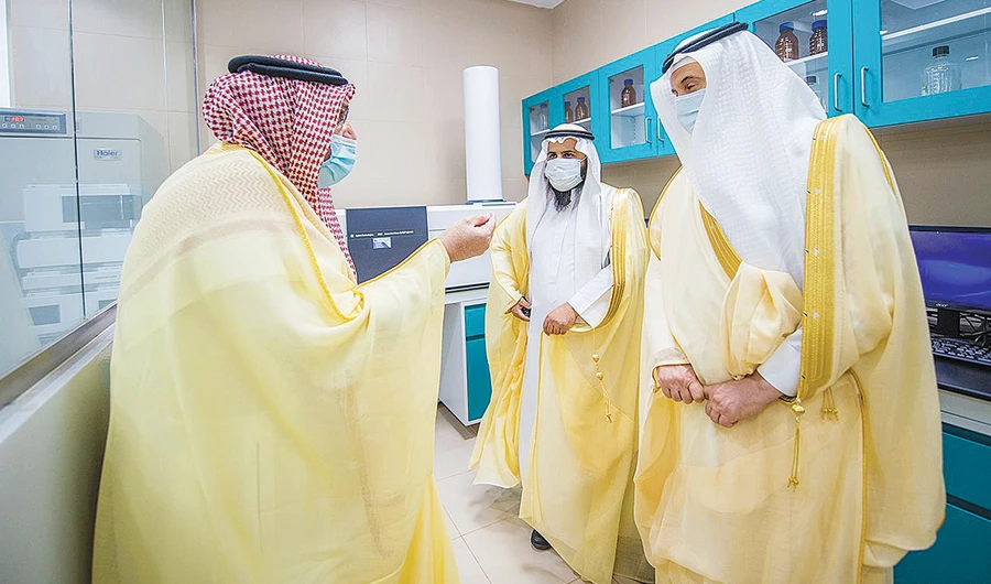 Qassim Gov. Prince Faisal bin Mishaal, left, during a briefing on the world’s largest camel hospital that he inaugurated in Buraidah on Sunday. (SPA)