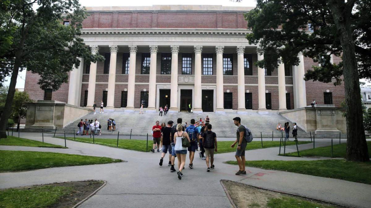 In this Aug. 13, 2019 file photo, students walk near the Widener Library in Harvard Yard at Harvard University in Cambridge, Mass. (AP)