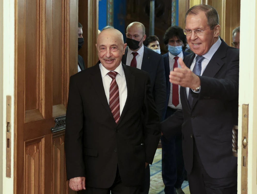 In this photo provided by Russian Foreign Ministry Press Service, Russian Foreign Minister Sergey Lavrov, right, welcomes Libya's parliament speaker Aguila Saleh for talks in Moscow, Russia, Friday, July 3, 2020. (AP)