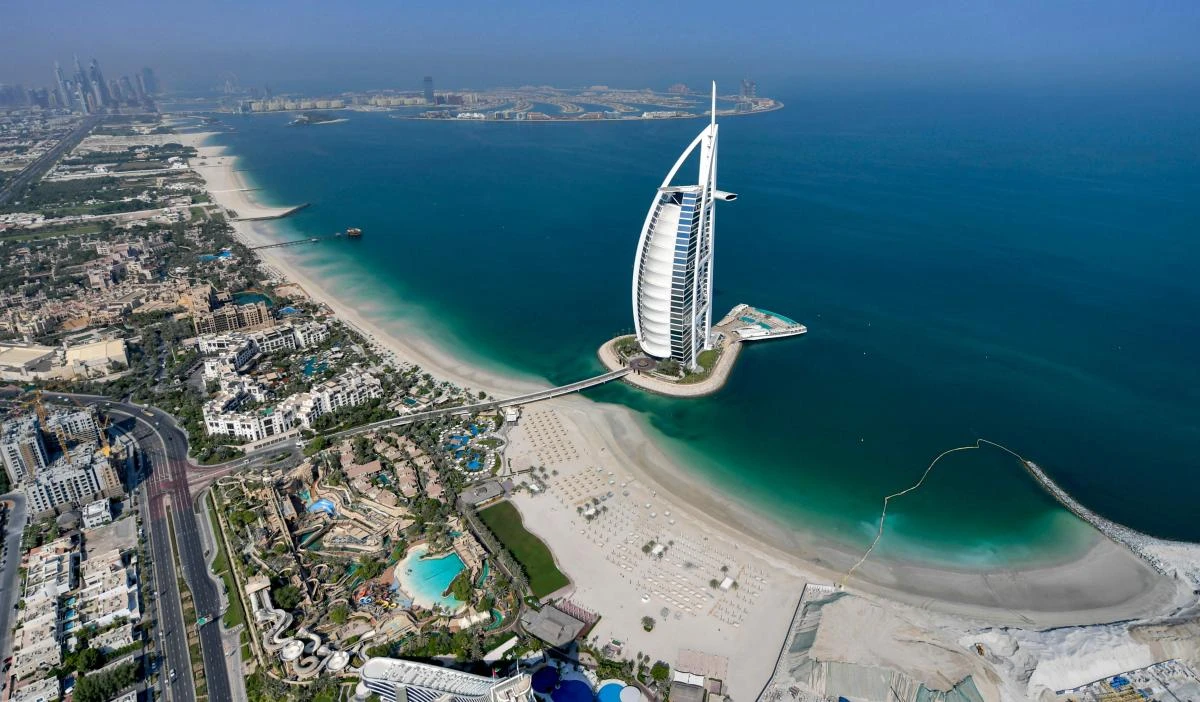 This picture taken on July 8, 2020 shows an aerial view of the Burj Al-Arab hotel in the Gulf emirate of Dubai, during a government-organised plane tour. (AFP)