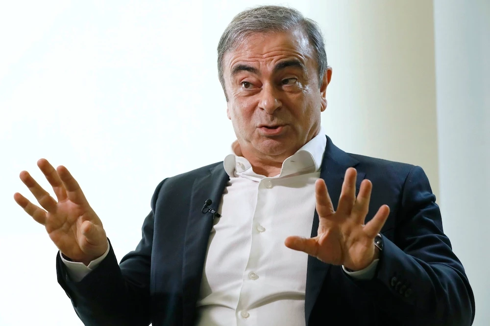 US says Ghosn wired money to man who helped him flee Japan