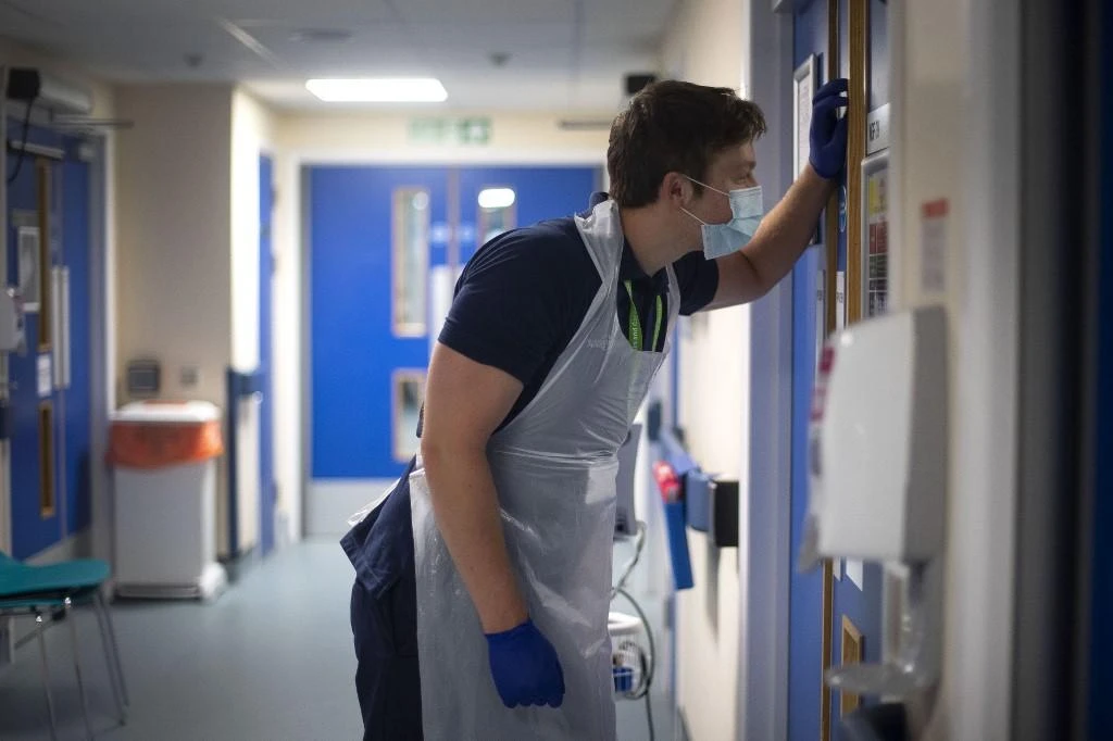 Specialists in London have linked COVID-19 to a rare form of brain inflammation. (File/AFP)