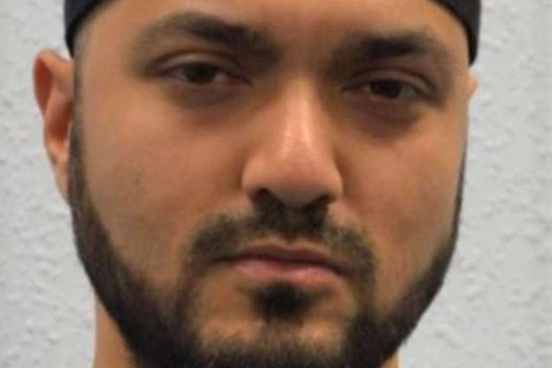 An undated handout picture released by the British Metropolitan Police Service (MPS) on July 9, 2020 shows Mohiussunnath Chowdhury posing for his custody photograph. (AFP)
